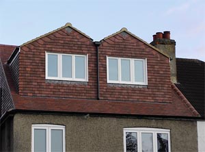 loft conversion - the use of former windows increases size and overall room height